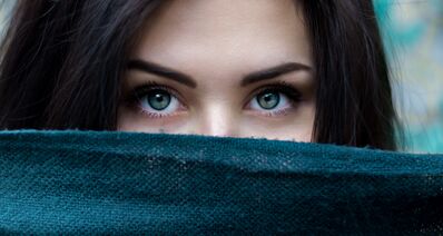 Keywords: girl,kid,child,covered by blue cloth,eyes looking up,dark hair