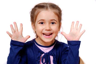 Keywords: girl,kid,child,happy,blue,navy,outfit,hands up,smiling