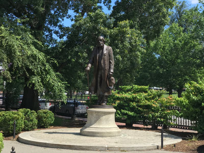 Keywords: boston,garden,old man,statue,park,painting a statue in the park