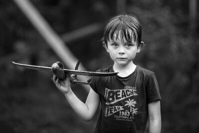 Keywords: portrait,child,kid,children,boy with toy plane,black and white,class,Children portrait class 1B January 21 2021 - 2:45:10