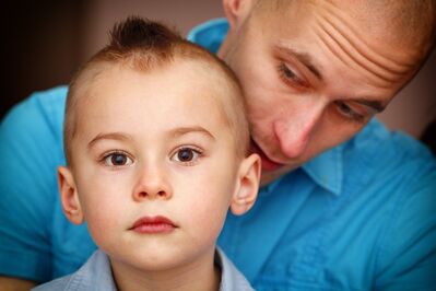 Keywords: portrait,boy with short hair,dad,father,blue shirt,two people,ears