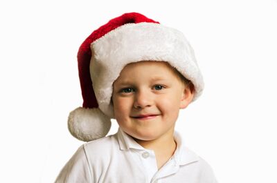 Keywords: christmas,boy,smile,smiling,child,red and white hat with white ball at the end