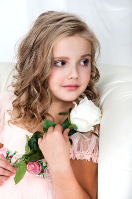 Keywords: girl,closeup,face,looking over shoulder,curly hair,white dress,roses,pink,hands