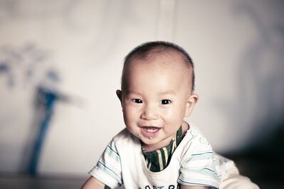 Keywords: child,boy,kid,infant,crawling,white outfit,asian