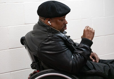 man-on-wheelchair-closeup
