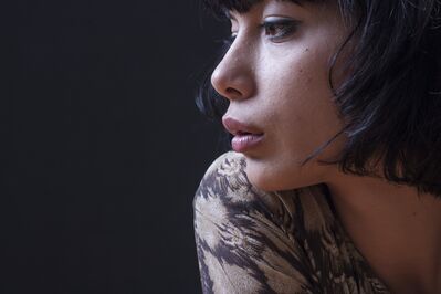 Keywords: profile,closeup,woman,grey and white top