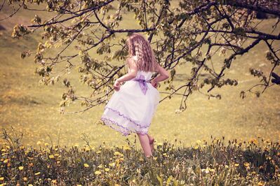 Keywords: girl,white and purple dress,tree,field,grass,walking away,youth,young