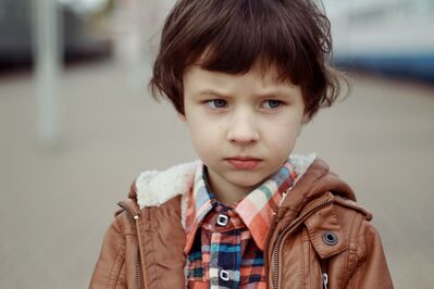 Keywords: portrait,child,kid,children,checkered shirt,tan jacket,plaid