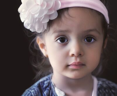 Keywords: portrait,child,girl,class demonstration,hairband,pink,blue top,shirt,flower,dark hair,Portrait of Children - September 24 2020