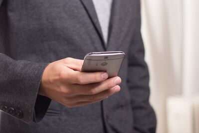 Keywords: hand,phone,holding a phone