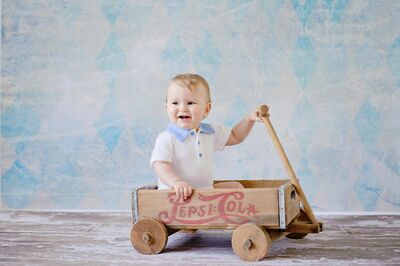 Keywords: portrait,child,kid,children,baby,wagon,wooden,pepsi cola,hands,sitting,white shirt