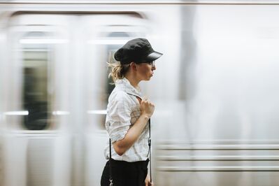 Keywords: train,train station,lady,woman,woman with hat