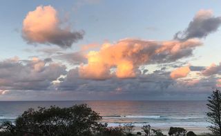 Keywords: clouds,orange,water,bushes