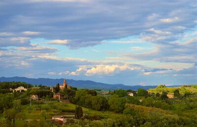 Keywords: village,green trees,big sky,blue