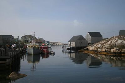 Keywords: harbor,shanties,houses,rocks,ocean,reflections