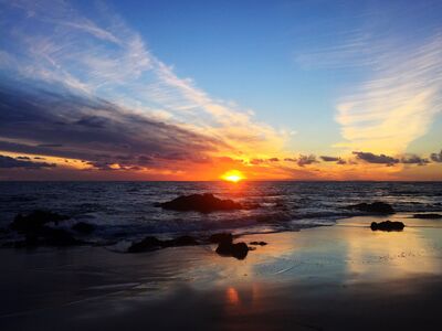 Keywords: sea,sunrise,rock,water,ocean,clouds