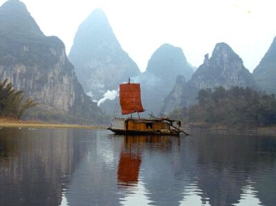 Keywords: sailboat,river,lake,water,china,red sailboat,sail boat,mountain,mountains,painting a Chinese river boat with a red sail