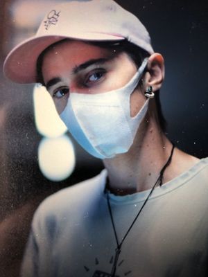 Keywords: cap,mask,boy,girl,white shirt,pink,earring,necklace,short hair