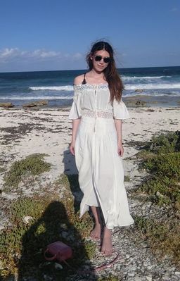 Keywords: girl,beach,white dress,sunglasses,purse,photographer,shadow,long brown hair,black swimsuit,bare feet