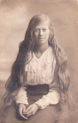 Keywords: young girl with long hair