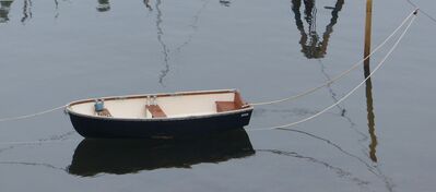 Keywords: skiff,rowboat,water,ocean,sea,reflection