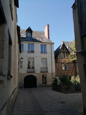 Keywords: narrow street,european city,old building,homes,houses