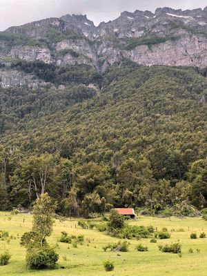 Keywords: red roof under mountain