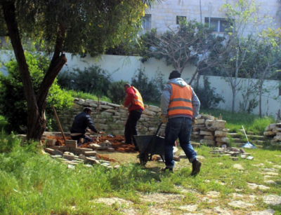 Keywords: painting two men building a wall