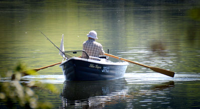 Keywords: painting a man rowing on a pond,lake