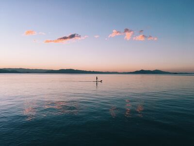 Keywords: boat,water,ocean,clouds,reflections,sea