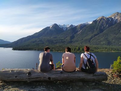 Keywords: three friends by lake,mountains