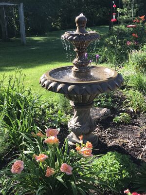 Keywords: birdbath,stature,garden,painting a garden statue