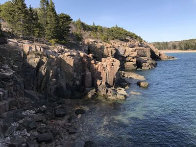 Keywords: clif,mountain,water,beach