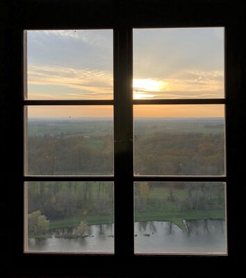 Keywords: Looking out a window somewhere in Austria,sunset