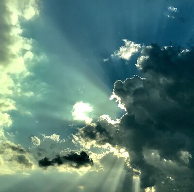 Keywords: clouds,sun,Taken at 37,000 ft from an airplane