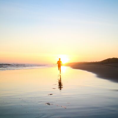 Keywords: boy,running,sunset,reflection